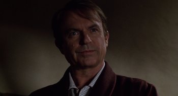 Movie still from “Bicentennial Man” (1999), directed by Chris Columbus – A person wearing a suit and tie; Close Up shot, Low angle