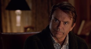 Movie still from “Bicentennial Man” (1999), directed by Chris Columbus – A person sitting in a chair; Close Up shot, Over the shoulder angle