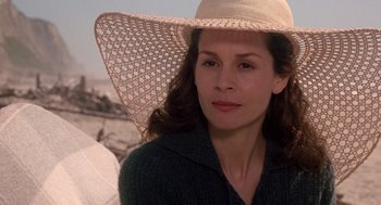 Movie still from “Bicentennial Man” (1999), directed by Chris Columbus – A person wearing a hat; Close Up shot, Over the shoulder angle