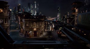 Movie still from “Bicentennial Man” (1999), directed by Chris Columbus – A view of a city at night from a building; Extreme Wide shot, High angle