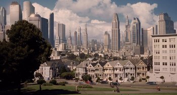 Movie still from “Bicentennial Man” (1999), directed by Chris Columbus – A view of a bunch of houses in a city; Extreme Wide shot, High angle