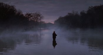 Movie still from “Big Fish” (2003), directed by Tim Burton – A man standing in the middle of a lake fishing; Extreme Wide shot, High angle