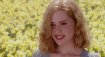 Movie still from “Big Fish” (2003), directed by Tim Burton – A person with blond hair; Close Up shot, Over the shoulder angle