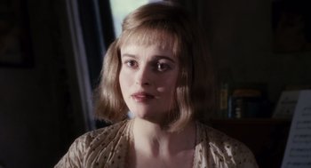 Movie still from “Big Fish” (2003), directed by Tim Burton – A person wearing a dress; Close Up shot, Over the shoulder angle