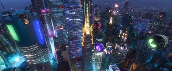 Movie still from “Big Hero 6” (2014), directed by Chris Williams – An aerial view of a skyscraper lit up at night; Extreme Wide shot, Overhead angle