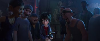 Movie still from “Big Hero 6” (2014), directed by Chris Williams – A group of people standing in a room with a boy holding a gun; Medium shot, Over the shoulder angle
