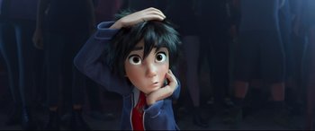Movie still from “Big Hero 6” (2014), directed by Chris Williams – A young boy with his hand on his head; Close Up shot, High angle