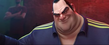 Movie still from “Big Hero 6” (2014), directed by Chris Williams – An image of a man with a big smile on his face; Close Up shot, Low angle