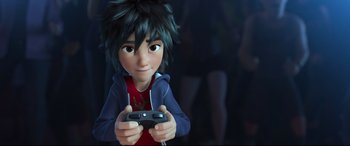 Movie still from “Big Hero 6” (2014), directed by Chris Williams – A boy is holding a video game controller; Close Up shot, High angle
