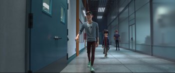 Movie still from “Big Hero 6” (2014), directed by Chris Williams – A group of people walking down a hall way; Wide shot, Over the shoulder angle