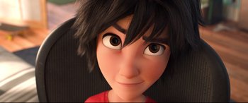 Movie still from “Big Hero 6” (2014), directed by Chris Williams – A person's face with big eyes; Extreme Close Up shot, Low angle