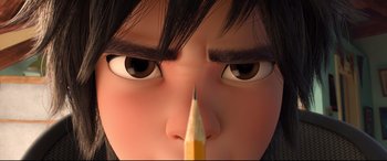 Movie still from “Big Hero 6” (2014), directed by Chris Williams – A person's face with a pencil in it's mouth; Extreme Close Up shot, Overhead angle