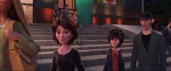 Movie still from “Big Hero 6” (2014), directed by Chris Williams – Two animated women standing next to each other on steps; Medium shot, Over the shoulder angle
