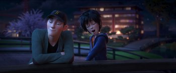 Movie still from “Big Hero 6” (2014), directed by Chris Williams – Two animated people sitting on a bench at night; Medium shot, Over the shoulder angle