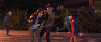 Movie still from “Big Hero 6” (2014), directed by Chris Williams – A man and two women standing next to each other on a sidewalk; Medium shot, Over the shoulder angle