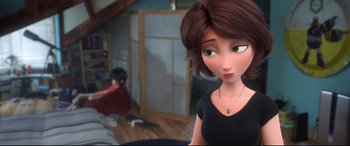 Movie still from “Big Hero 6” (2014), directed by Chris Williams – A woman in a black shirt is standing in a room; Close Up shot, Over the shoulder angle