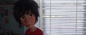 Movie still from “Big Hero 6” (2014), directed by Chris Williams – A person's face in front of a window; Close Up shot, Over the shoulder angle