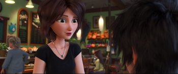 Movie still from “Big Hero 6” (2014), directed by Chris Williams – A woman is looking at the camera in a store; Close Up shot, Over the shoulder angle