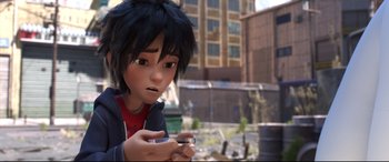 Movie still from “Big Hero 6” (2014), directed by Chris Williams – A boy is looking at his cell phone outside; Close Up shot, High angle