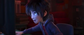 Movie still from “Big Hero 6” (2014), directed by Chris Williams – A person's face in a cartoon style; Close Up shot, Over the shoulder angle