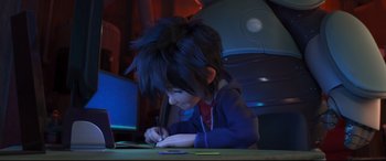 Movie still from “Big Hero 6” (2014), directed by Chris Williams – A young boy sitting at a table writing on a piece of paper; Medium shot, High angle