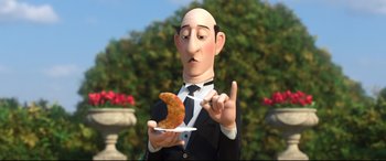 Movie still from “Big Hero 6” (2014), directed by Chris Williams – An animated man holding a piece of food; Close Up shot, Over the shoulder angle