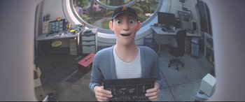 Movie still from “Big Hero 6” (2014), directed by Chris Williams – A man is holding up a sign in a room; Medium shot, Over the shoulder angle