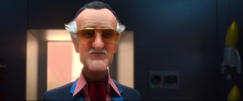 Movie still from “Big Hero 6” (2014), directed by Chris Williams – A man with glasses and a mustache wearing a suit and tie; Close Up shot, Low angle