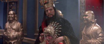 Movie still from “Big Trouble in Little China” (1986), directed by John Carpenter – A man and a woman dressed in traditional chinese clothing; Close Up shot, Over the shoulder angle