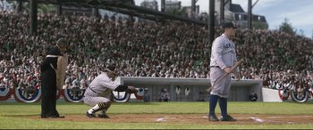 Movie still from “Bill & Ted Face the Music” (2020), directed by Dean Parisot – A baseball player kneeling down to catch a ball; Extreme Wide shot, High angle