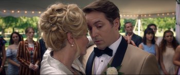 Movie still from “Bill & Ted Face the Music” (2020), directed by Dean Parisot – A man and a woman in formal wear looking at each other; Close Up shot, Over the shoulder angle