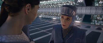 Movie still from “Bill & Ted Face the Music” (2020), directed by Dean Parisot – A woman wearing a helmet talking to another woman; Close Up shot, Over the shoulder angle