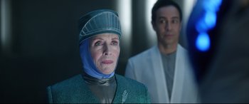 Movie still from “Bill & Ted Face the Music” (2020), directed by Dean Parisot – A woman in a green jacket and a man in a white jacket; Close Up shot, Over the shoulder angle