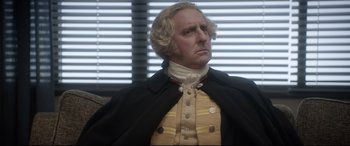 Movie still from “Bill & Ted Face the Music” (2020), directed by Dean Parisot – A person wearing a costume; Close Up shot, Over the shoulder angle