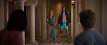 Movie still from “Bill & Ted Face the Music” (2020), directed by Dean Parisot – A couple of men standing next to each other in a hallway; Wide shot, Low angle