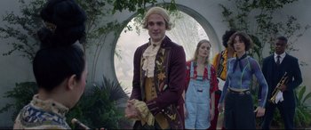 Movie still from “Bill & Ted Face the Music” (2020), directed by Dean Parisot – A man and a woman dressed in period clothing; Medium shot, Low angle