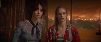 Movie still from “Bill & Ted Face the Music” (2020), directed by Dean Parisot – Two young women standing next to each other in front of a mirror; Medium shot, Over the shoulder angle