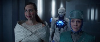 Movie still from “Bill & Ted Face the Music” (2020), directed by Dean Parisot – A woman standing next to two other women; Medium shot, Over the shoulder angle