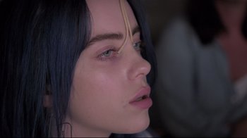 Movie still from “Billie Eilish: The World's a Little Blurry” (2021), directed by R.J. Cutler – A person with blue eyes; Close Up shot, High angle