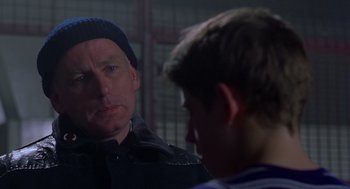 Movie still from “Billy Elliot” (2000), directed by Stephen Daldry – A man and a young boy are looking at each other; Close Up shot, Over the shoulder angle