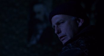 Movie still from “Billy Elliot” (2000), directed by Stephen Daldry – A man in a black hat is looking at the camera; Close Up shot, Low angle