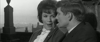 Movie still from “Billy Liar” (1963), directed by John Schlesinger – An older woman and a young man are talking; Close Up shot, Low angle