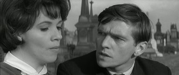 Movie still from “Billy Liar” (1963), directed by John Schlesinger – A man and a woman talking to each other; Close Up shot, Over the shoulder angle