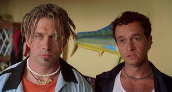 Movie still from “Bio-Dome” (1996), directed by Jason Bloom – A couple of men standing next to each other; Close Up shot, Low angle