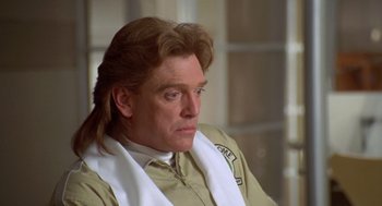 Movie still from “Bio-Dome” (1996), directed by Jason Bloom – A person with long hair; Close Up shot, Low angle