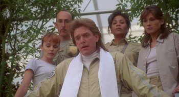 Movie still from “Bio-Dome” (1996), directed by Jason Bloom – A group of men and women standing next to each other; Close Up shot, Low angle
