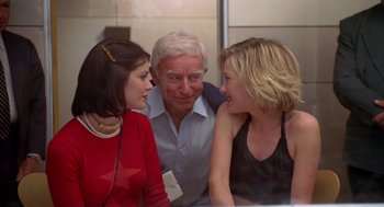 Movie still from “Bio-Dome” (1996), directed by Jason Bloom – Two women and an older man are talking to each other; Medium shot, Over the shoulder angle