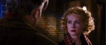 Movie still from “Black Book” (2006), directed by Paul Verhoeven – A man and a woman are looking at one another; Close Up shot, Over the shoulder angle