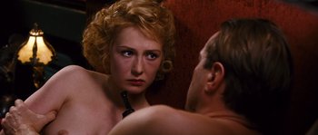 Movie still from “Black Book” (2006), directed by Paul Verhoeven – A man and a woman are looking at one another; Close Up shot, High angle