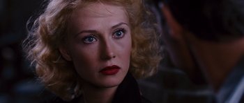 Movie still from “Black Book” (2006), directed by Paul Verhoeven – A person with blue eyes; Close Up shot, Over the shoulder angle